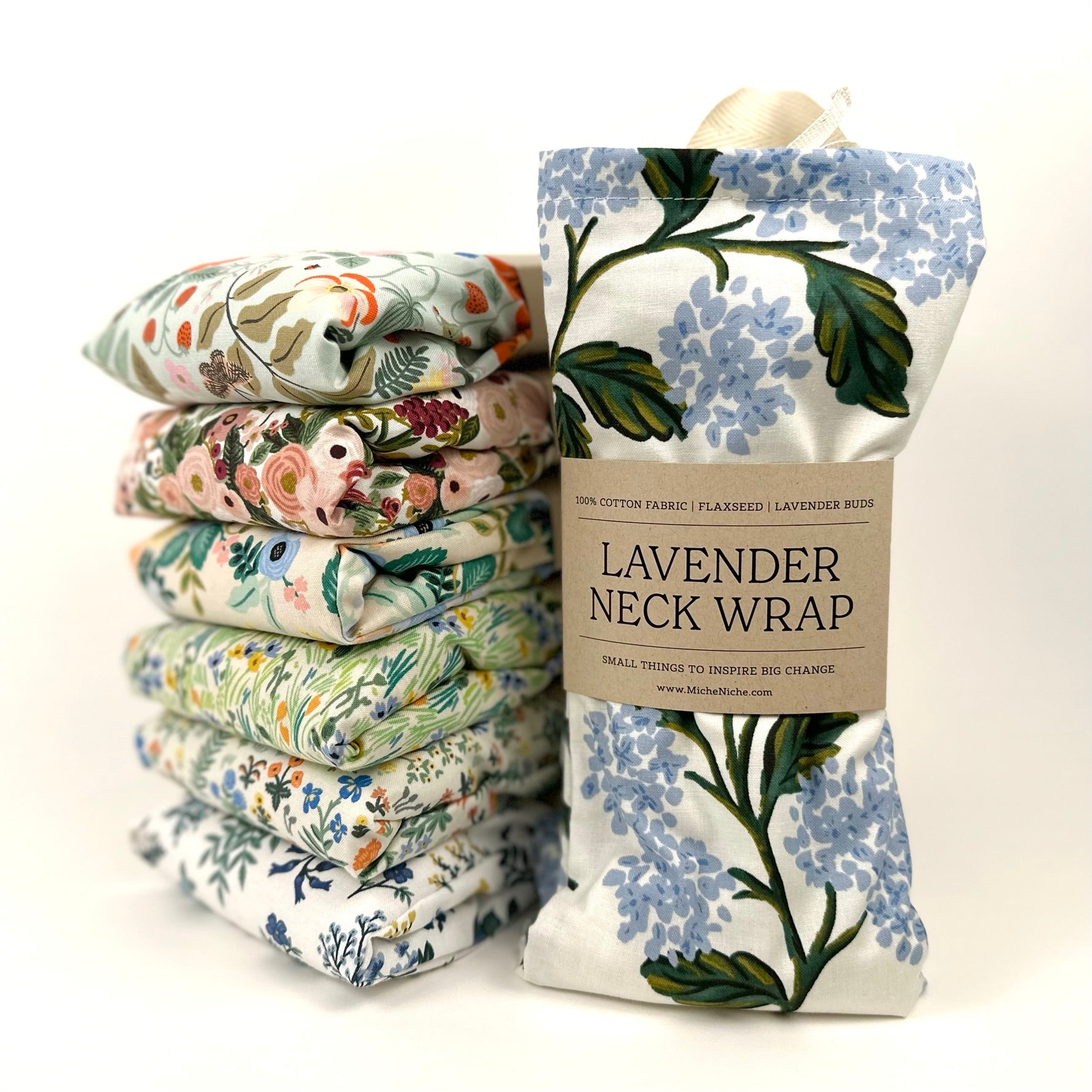 A Collection of Miche Niche Lavender Neck Wraps featuring Rifle Paper Co patterns.